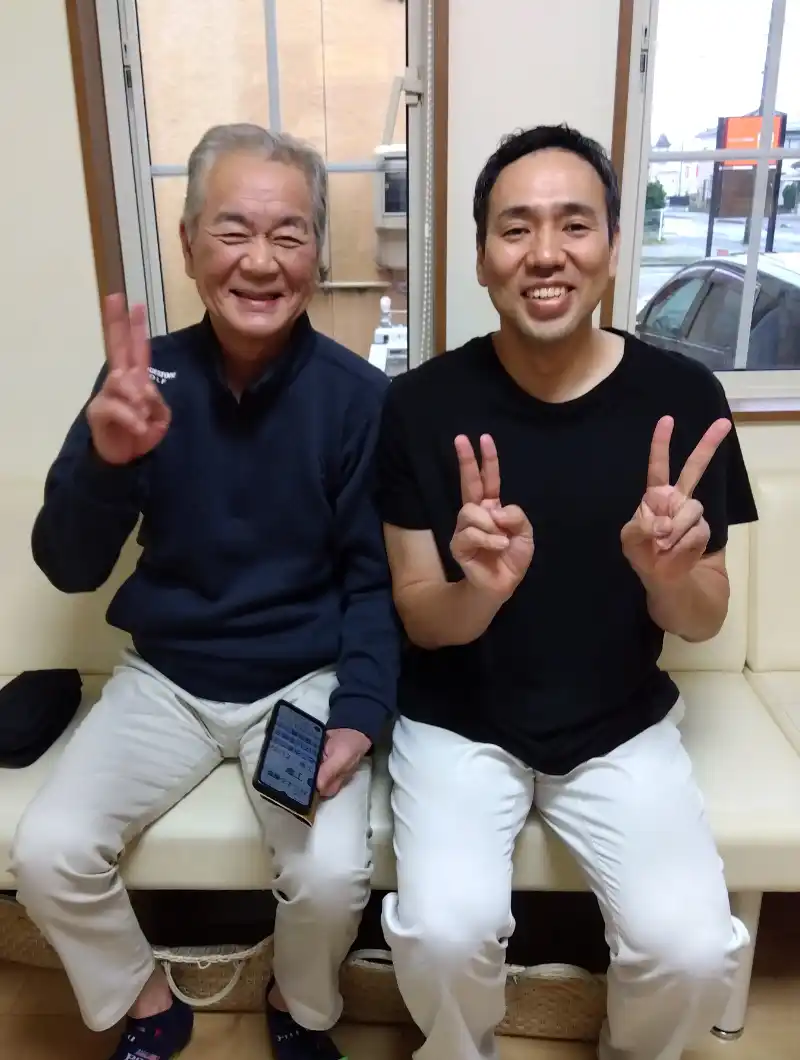 男性患者様と笑顔でツーショット